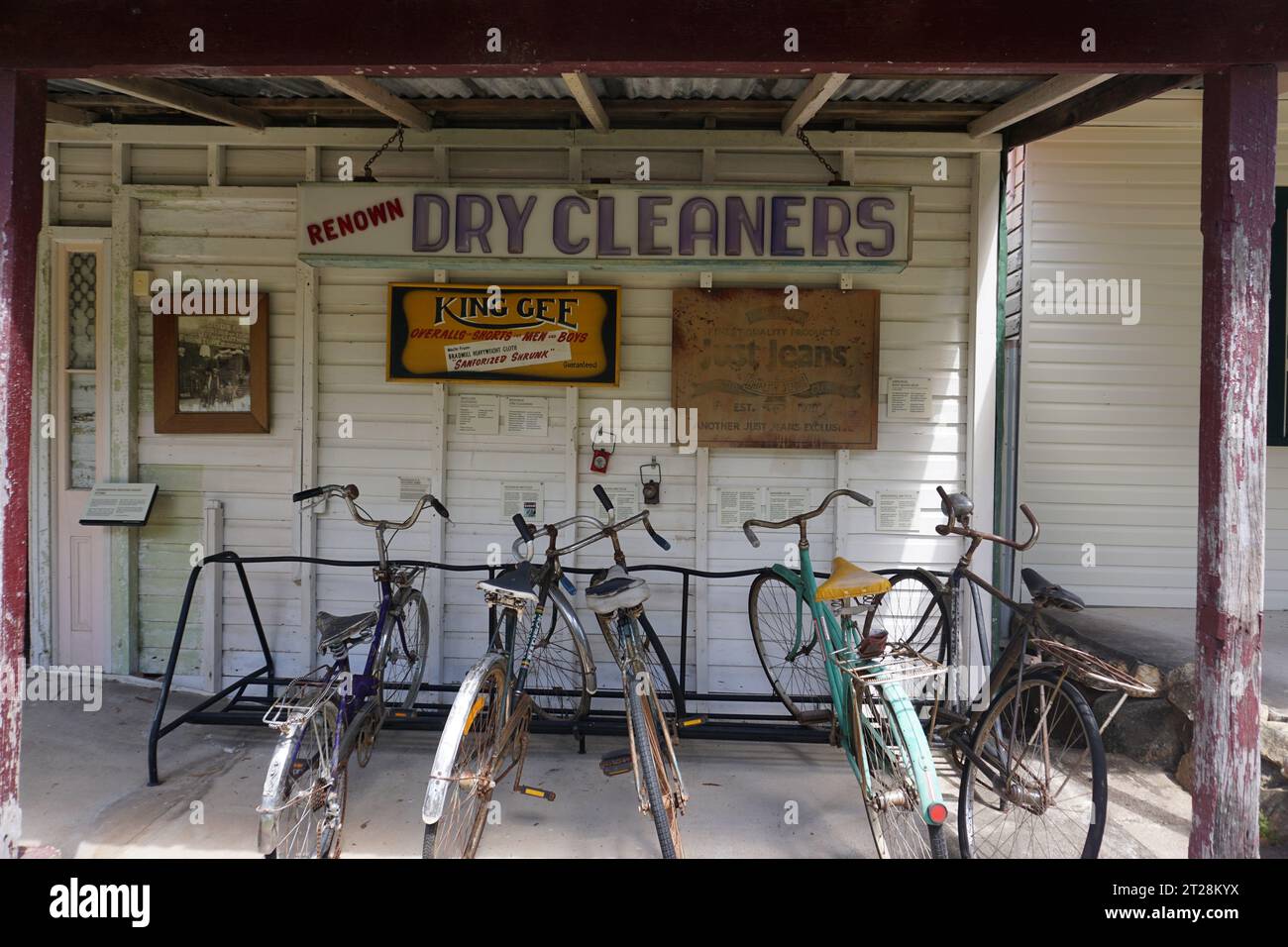 Exterior of dry cleaners with old fashioned bikes in front in