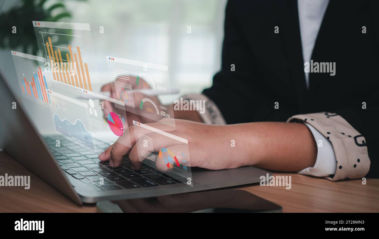 Businesswoman use computers to analyze business and manage corporate