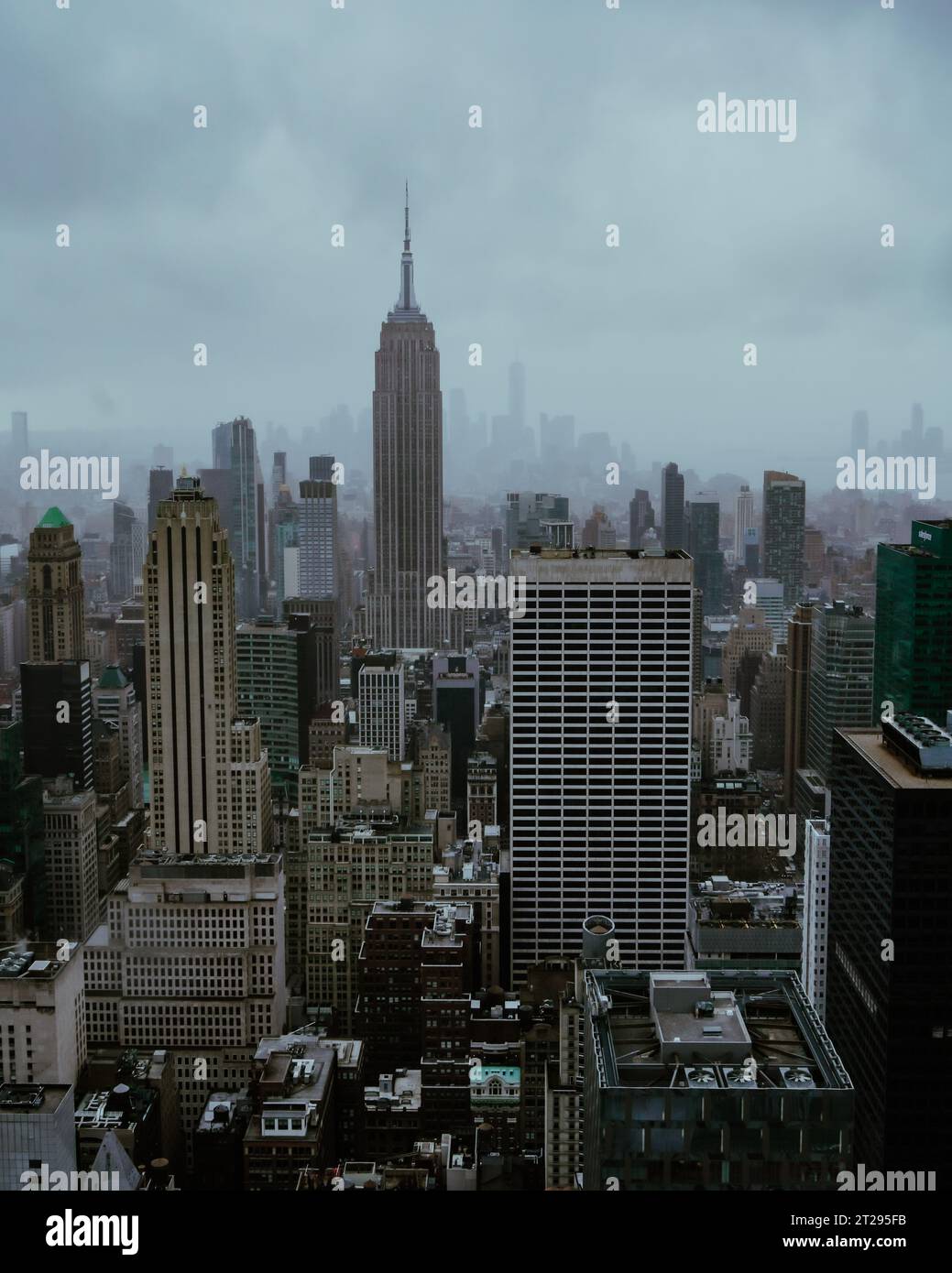 New york city skyscrapers skyline buildings rainy day Stock Photo - Alamy