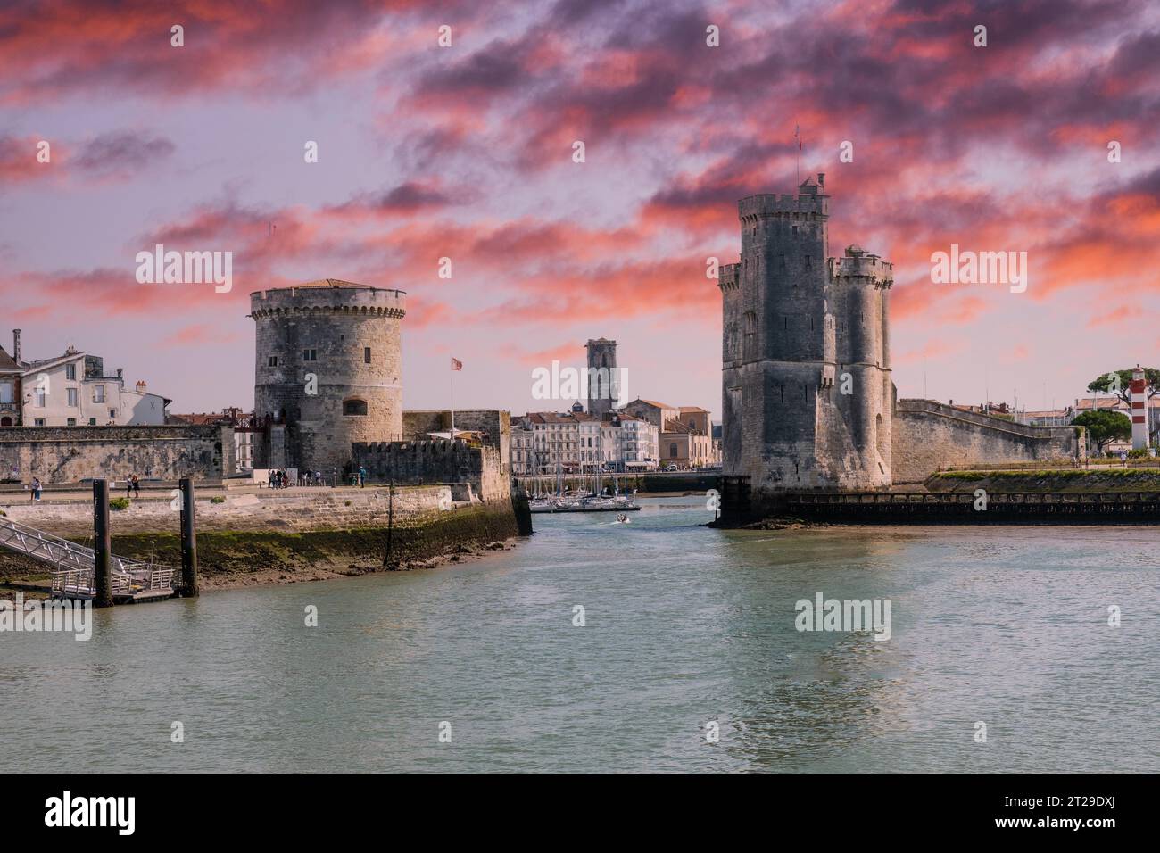 The beautiful entrance with the towers of the fort in La Rochelle. Coastal town in southwestern France Stock Photo