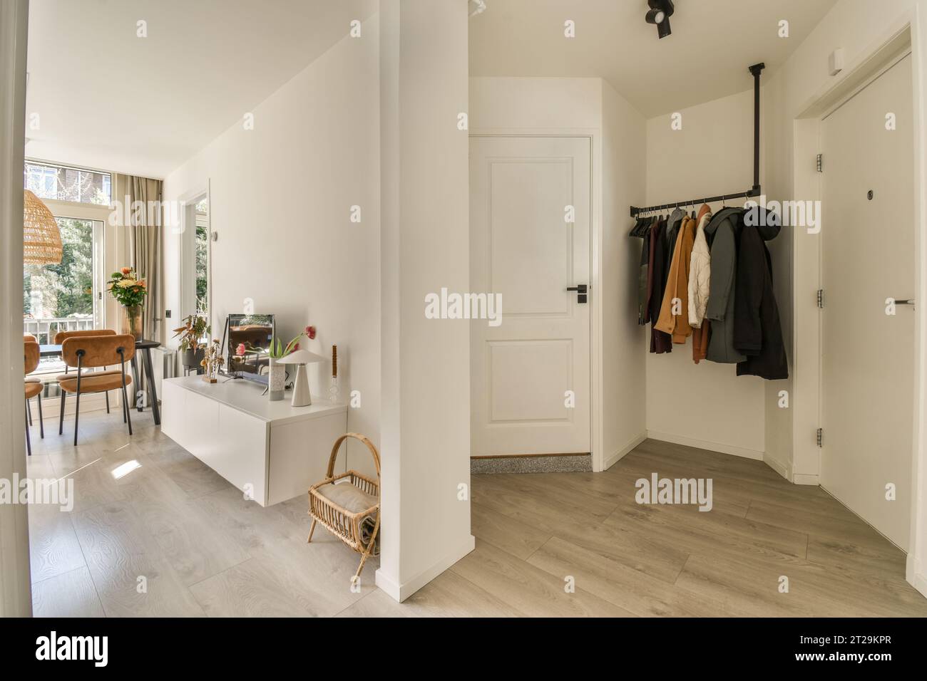 Coats hanging wall hi-res stock photography and images - Alamy