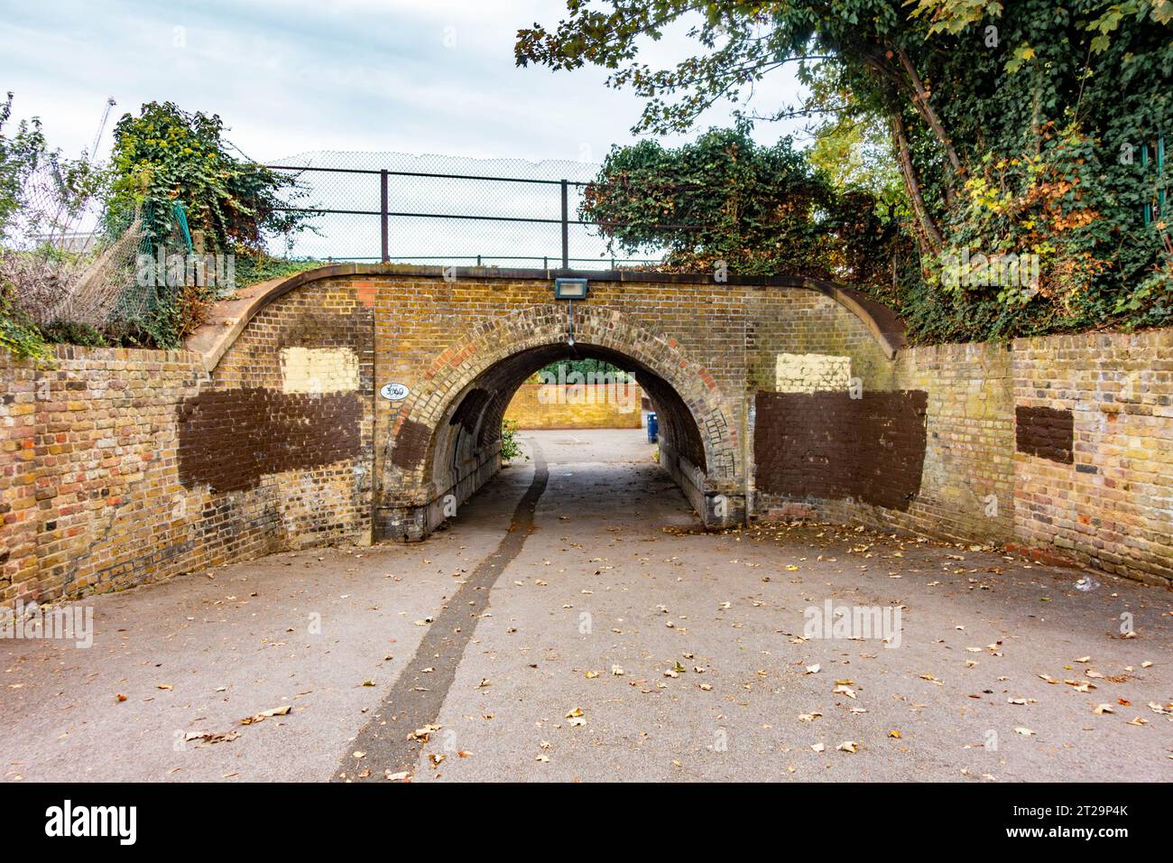 An underpass leading underneath a railway line at StainesuponThames