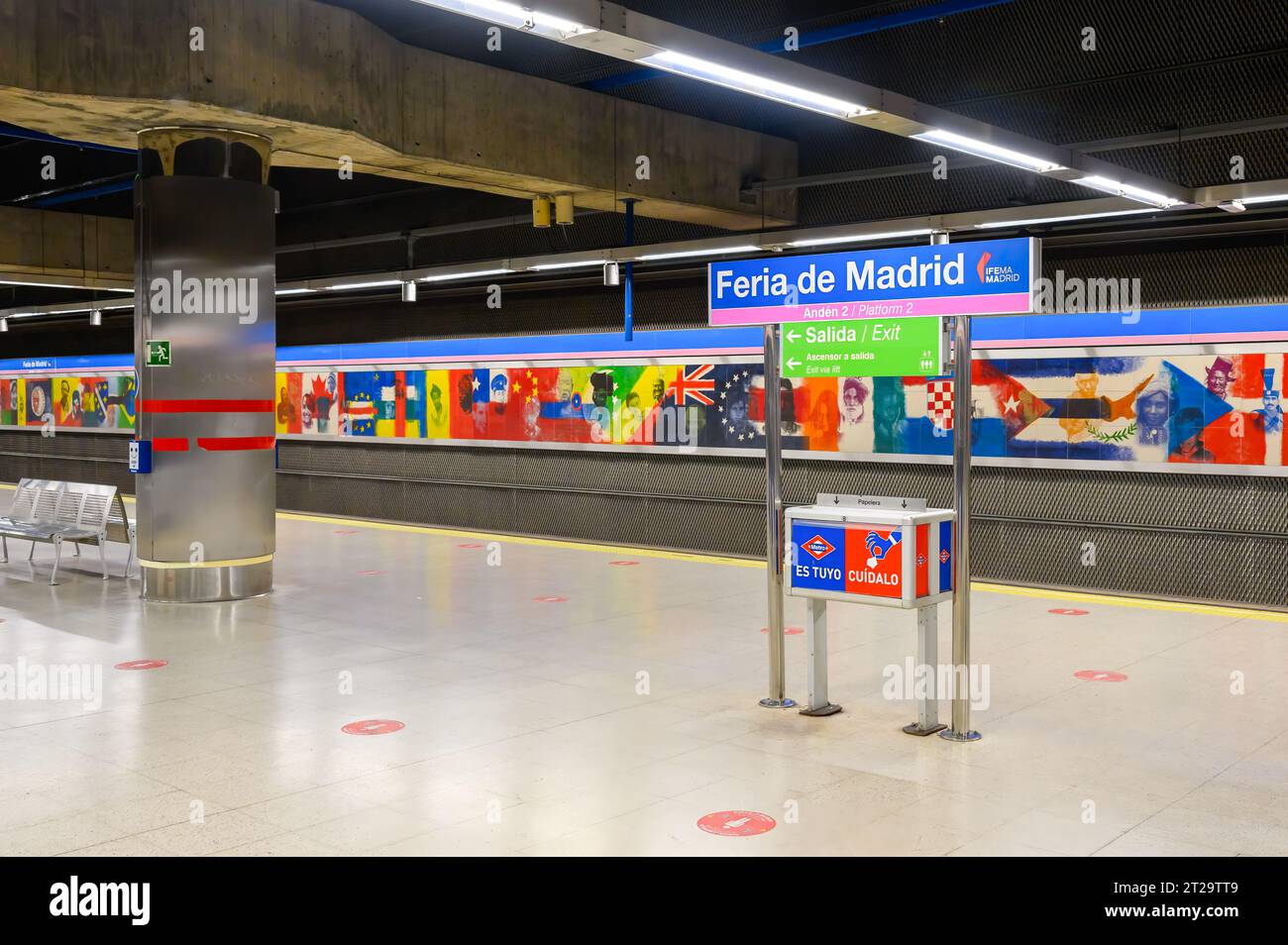 Colorful mural in Madrid subway station by Okuda San Miguel
