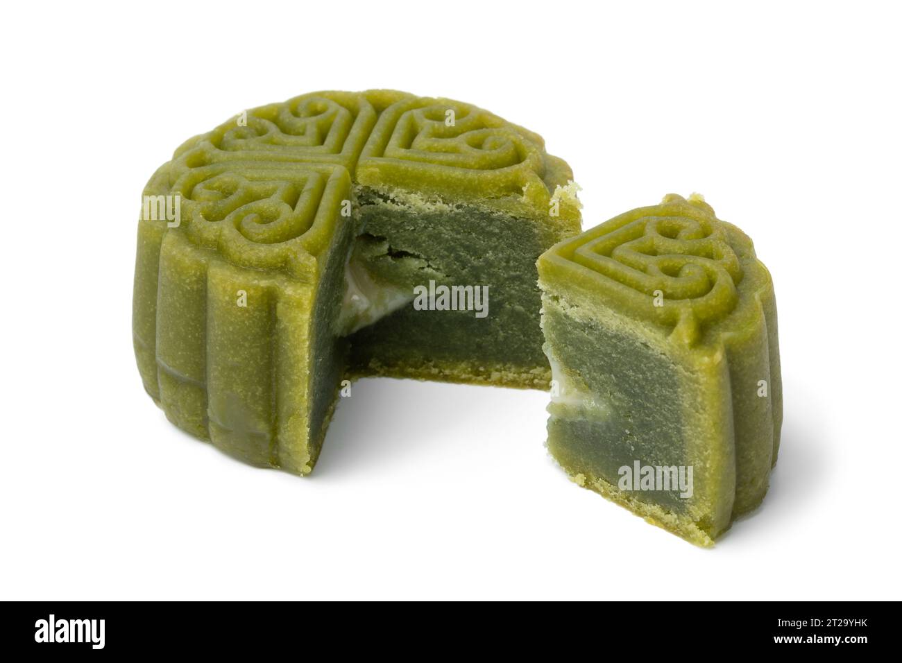 Green Snowskin or Crystal Skin Mooncake, a new variation of mooncake for Mid-Autumn Festival close up isolatede on white background Stock Photo