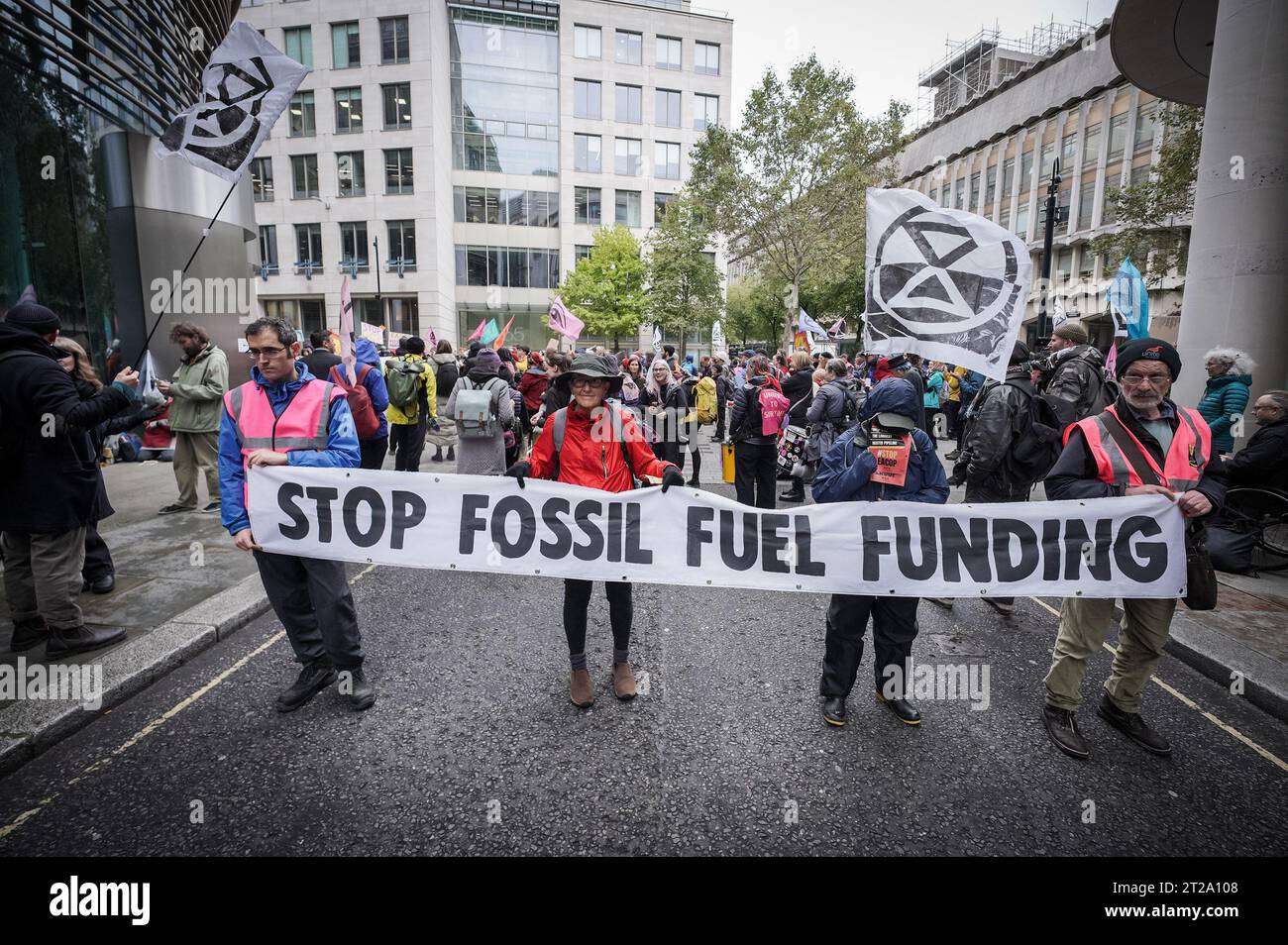 London, UK. 18th October, 2023. ‘Oily Money Out’ Climate change activists from Extinction Rebellion (XR) gather outside the offices of Standard Bank, 20 Gresham Street to demand an end to fossil fuels and to ‘stop the flow of oil’. Credit: Guy Corbishley/Alamy Live News Stock Photo