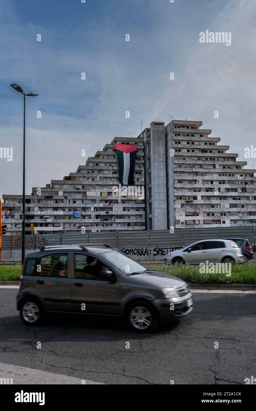 A large flag of about 30 metres with the colours of Palestine was displayed for a few minutes on the Vele in Scampia, at the initiative of activists of the Network for Palestine. About forty activists were present. The flag was displayed for a few minutes and then removed, attracting the attention of passers-by. Stock Photo
