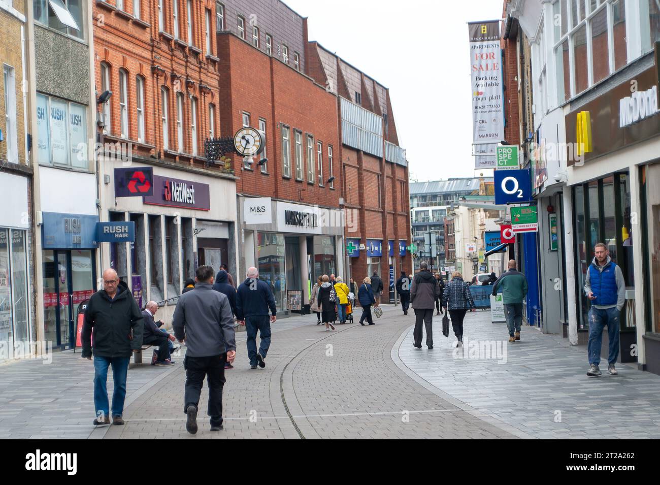 Maidenhead, Berkshire, UK. 18th October, 2023. Shoppers out in Maidenhead High Street, Berkshire. The Office for National Statistics has reported that the UK rate of inflation stayed at 6.7% in September which was the the same rate as August. The price of food and non-alcoholic drink prices have fallen for the first time since September 2021, however, petrol and diesel costs continue to rise. Credit: Maureen McLean/Alamy Live News Stock Photo