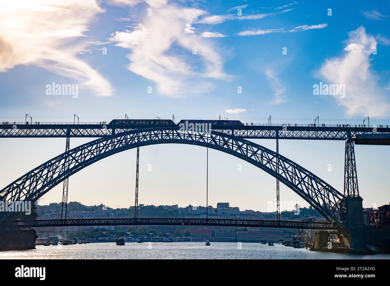 Metro train passing over the Ponte Dom Luis 1 bridge, over the River Douro, Porto, Portugal Stock Photo