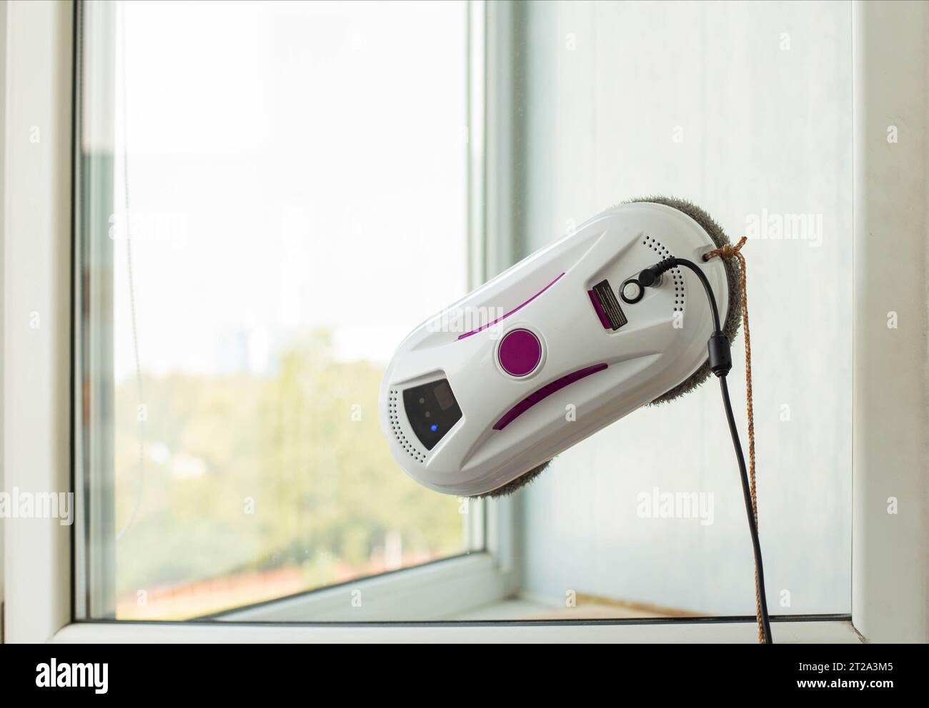 Clean windows safely with a window cleaning robot Stock Photo Alamy