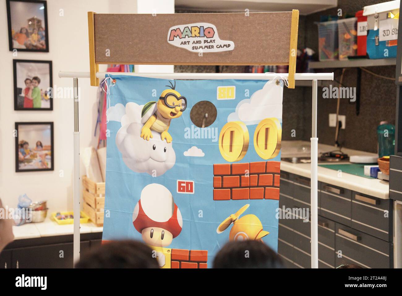 Kids playing Super Mario Bros Movie Bean Bag Toss GameThrowing