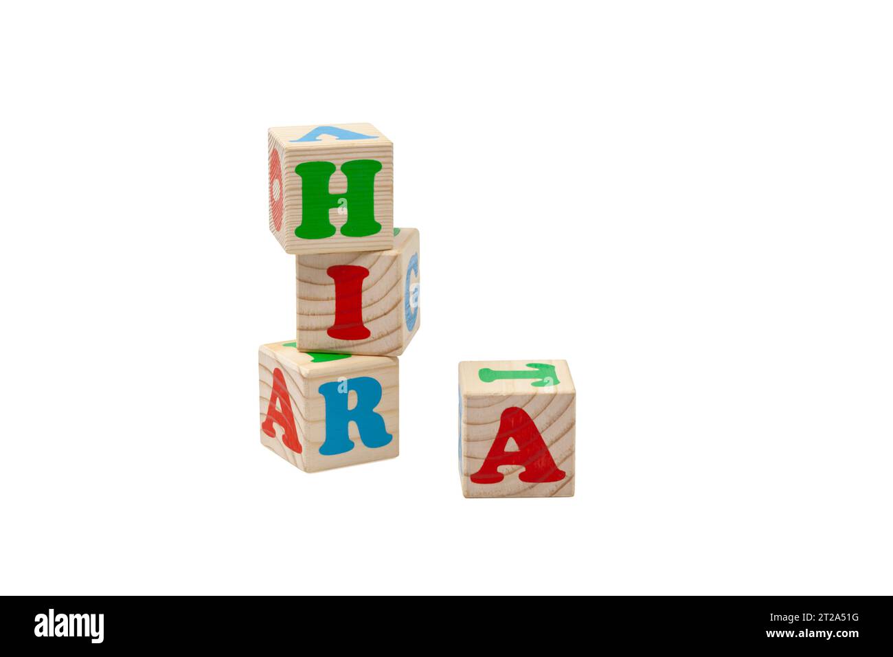 Children's wooden cubes with blue, red and green letters in the shape of a tower stand one on top of the other and lie side by side. For text. Stock Photo