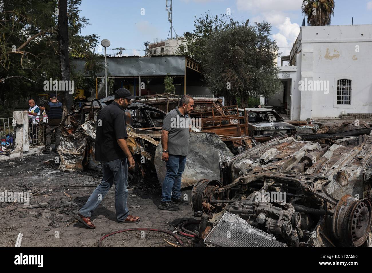 Gaza City, Palestinian Territories. 18th Oct, 2023. Palestinians inspect the destruction following the attack on the Ahli Arab Hospital, which killed dozens of civilians. Credit: Mohammad Abu Elsebah/dpa/Alamy Live News Stock Photo