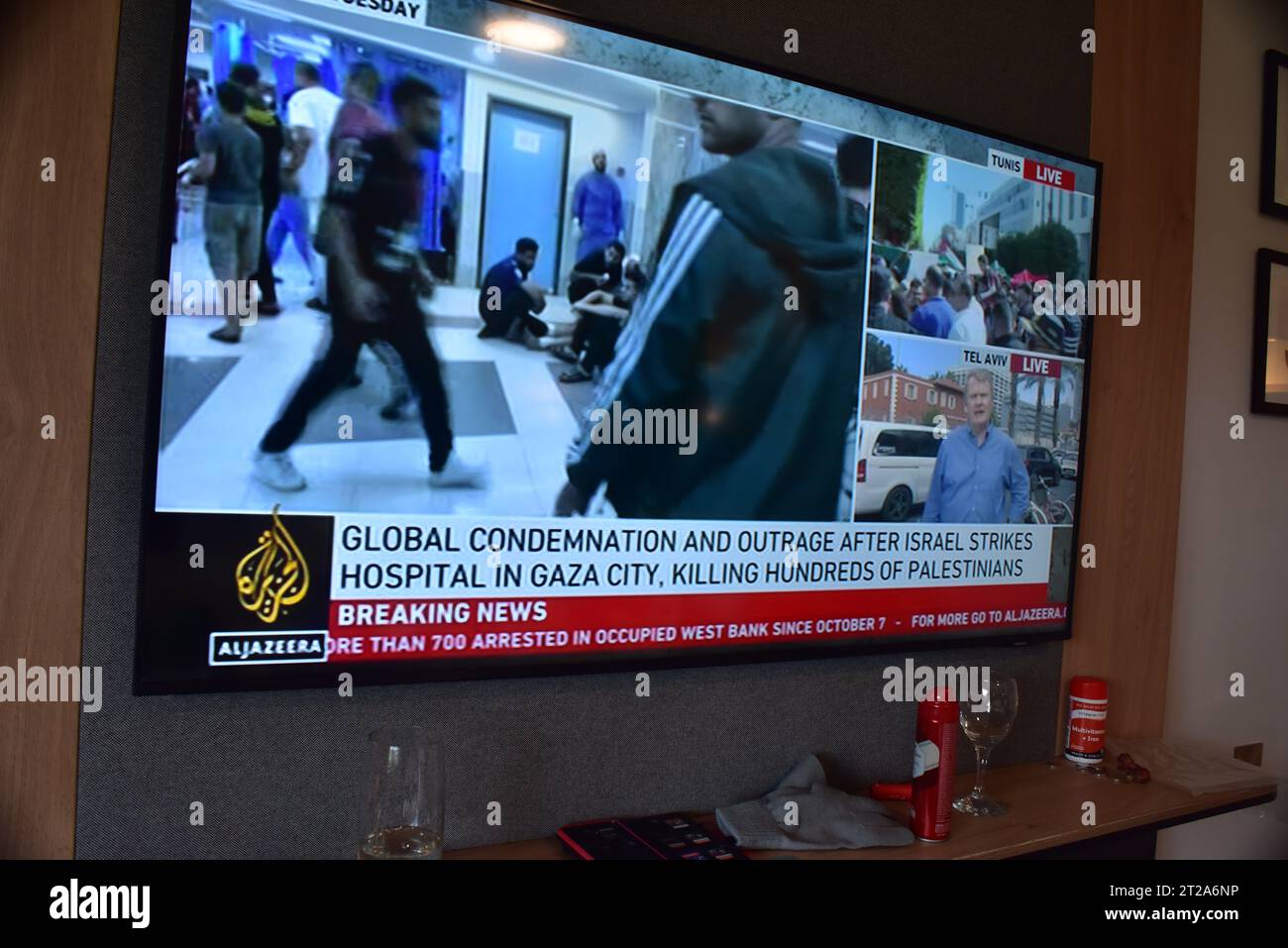 18th October, 2023. Various major TV channels report assertions on their chyrons of who was responsible for the bomb blast at the hospital in Gaza which killed hundreds, possibly thousands of people. Sky News reports the IDF press conference with evidence that it was caused by an Islamic Jihad misfired rocket, showing an infrared photo of the car park, saying there are no missile craters. Al Jazeera reports assertions it was carried out by Israel. The UK Foreign Office advises British citizens against all travel to Lebanon due to the risks as protesters take to the streets in Beirut. Stock Photo
