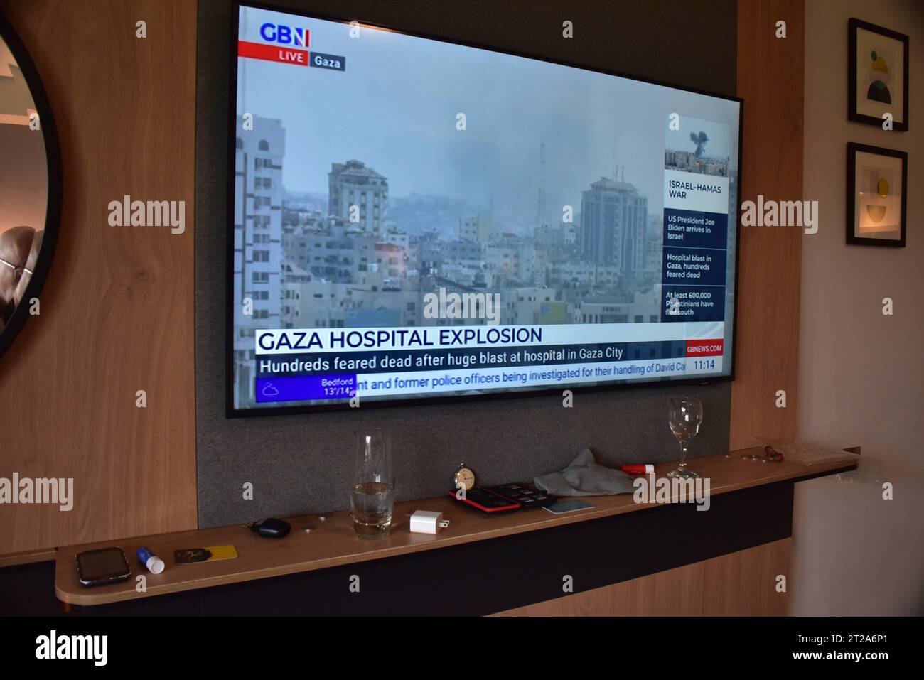 18th October,  2023. Various major TV channels report assertions on their chyrons of who was responsible for the bomb blast at the hospital in Gaza which killed hundreds, possibly thousands of people. Sky News reports the IDF press conference with evidence that it was caused by an Islamic Jihad misfired rocket, showing an infrared photo of the car park, saying there are no missile craters Al Jazeera reports assertions it was carried out by Israel. The UK Foreign Office advises British citizens against all travel to Lebanon due to the risks as protesters take to the streets in Beirut. Stock Photo