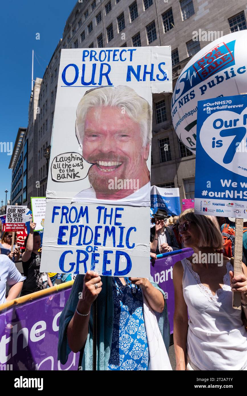 Protect our NHS against privatisation placard, featuring Richard Branson - referring to Virgin Care private health business. Celebrating NHS 70th Stock Photo
