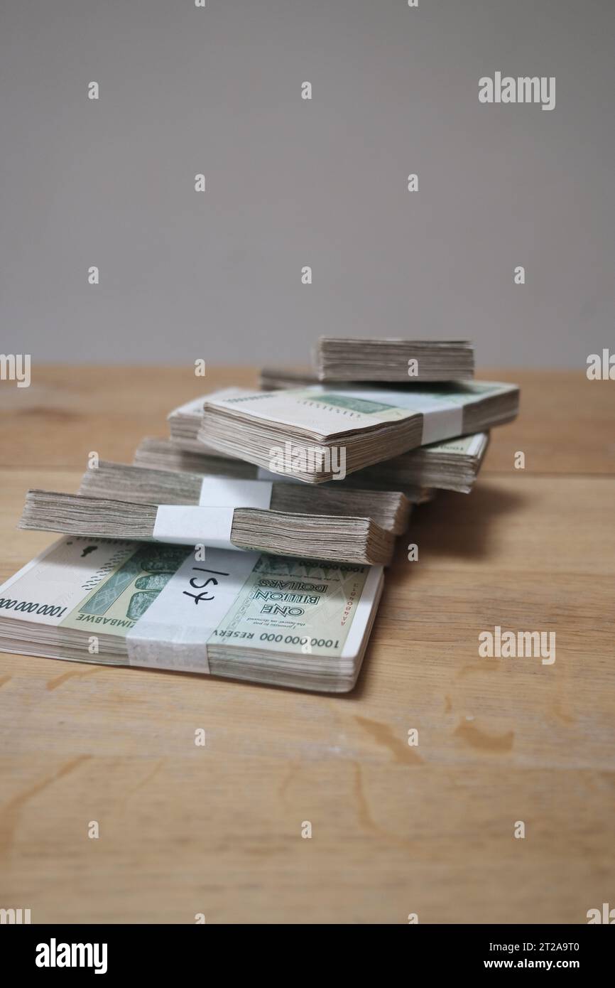 Stacks of Cash - Millions, Billions of Dollars. Zimbabwe Dollars after hyper inflation. Each note is One Billion Dollars Stock Photo