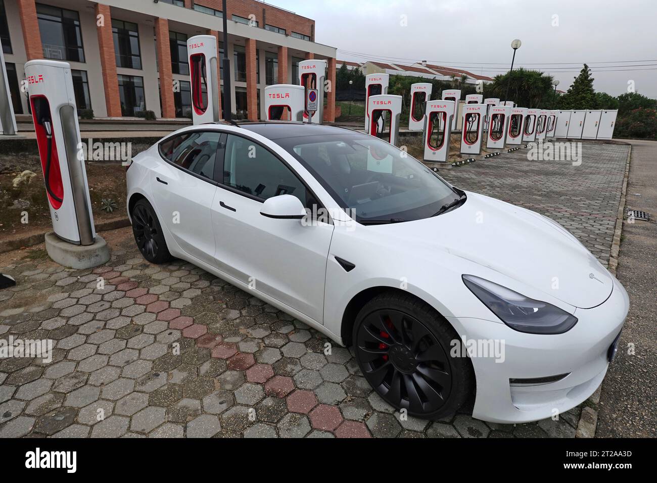 Tesla model 3 car rapid charging at the Tesla supercharger SUC in Mealhada, Portugal, Europe