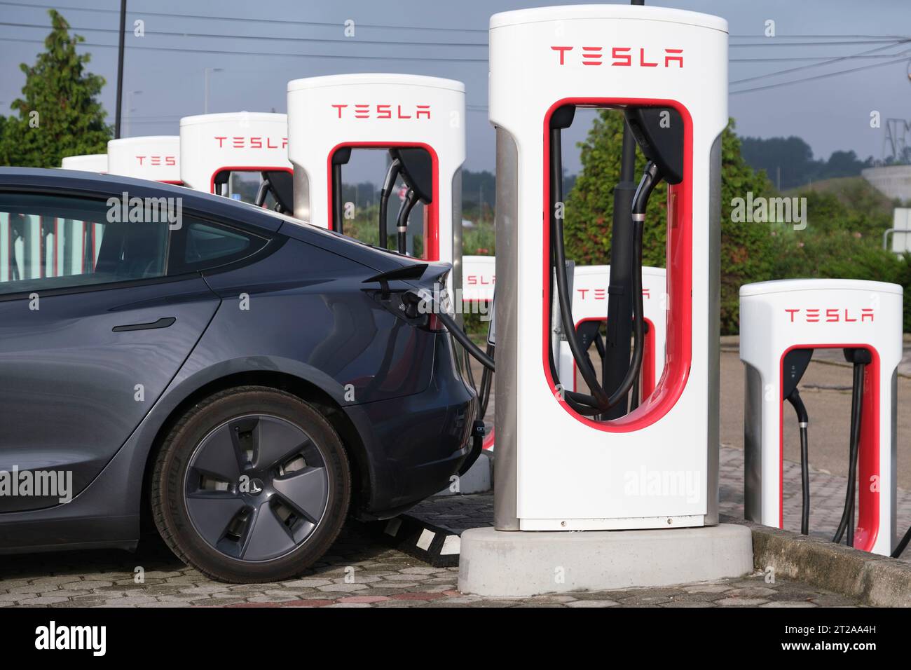 Tesla model 3 car rapid charging at the Tesla supercharger SUC in Mealhada, Portugal, Europe