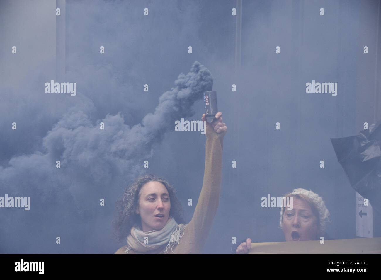 London, UK. 18th October 2023. Climate activists gather outside Standard Bank in the City of London in protest against the East African Crude Oil Pipeline (EACOP), calling on the bank to stop financing the project. Credit: Vuk Valcic/Alamy Live News Stock Photo