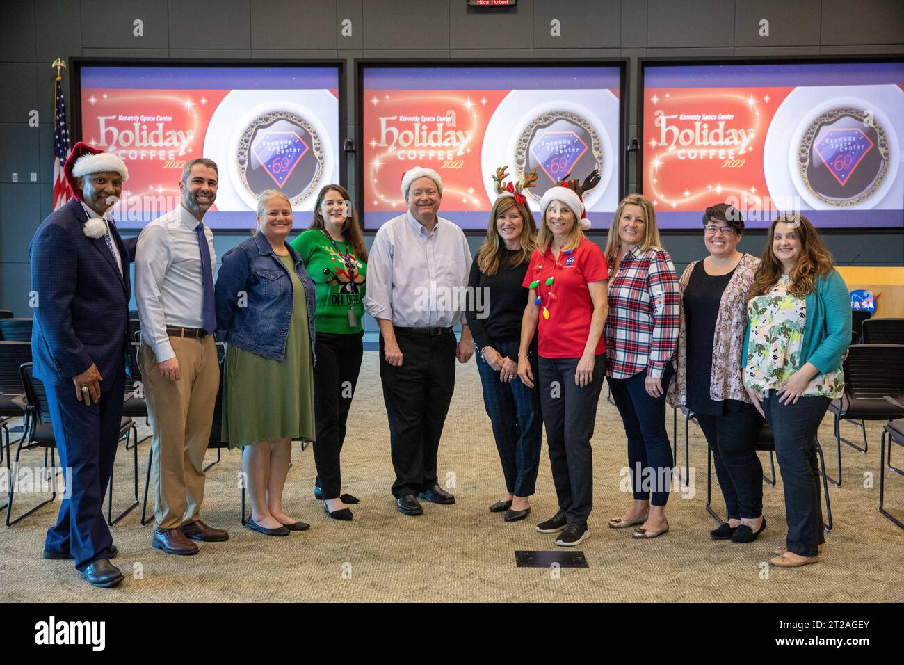 2022 Holiday Coffee. Kennedy Space Center Director Janet Petro, fourth from right, poses with other center leaders and support staff during the 2022 Center Director’s Holiday Coffee on Dec. 7, 2022, at NASA’s Kennedy Space Center in Florida. From left are Deputy Director Kelvin Manning; Kennedy Space Center employees Michael Haddad, Maggi Dutczak, and Cindy Rymer; Associate Director Technical Burt Summerfield; Associate Director Operations Jennifer Kunz; Petro; Kennedy employees Heidi Culp, Amber Chieffe, and Amanda Hayes. The annual holiday event is an opportunity for Kennedy employees and NA Stock Photo