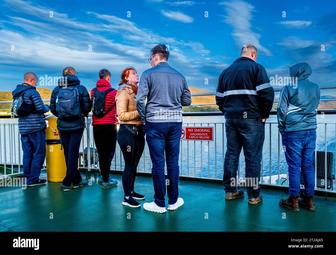 People watching as the car ferry leaves Ullapool in the Scottish