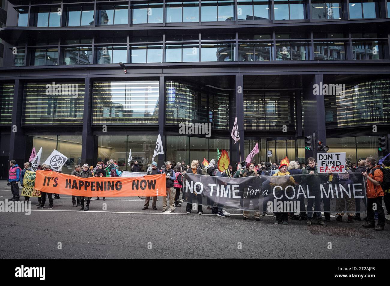 London, UK. 18th October, 2023. ÔOily Money OutÕ Climate change activists from Extinction Rebellion (XR) march and protest through the cityÕs financial district to demand an end to fossil fuels and to Ôstop the flow of oilÕ. Credit: Guy Corbishley/Alamy Live News Stock Photo
