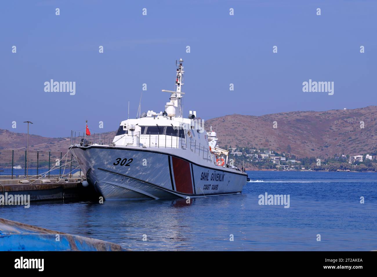 Turkish coast guard boat at park position in Bodrum Turkey in a sunny ...