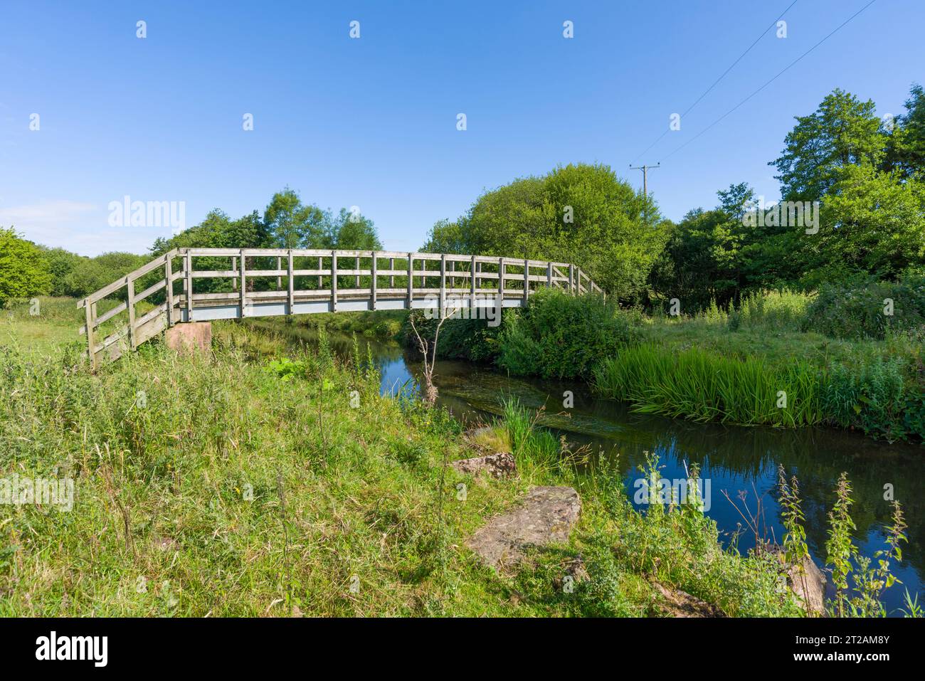 A footbridge over the River Culm in countryside at Culmstock, Devon, England Stock Photo Alamy