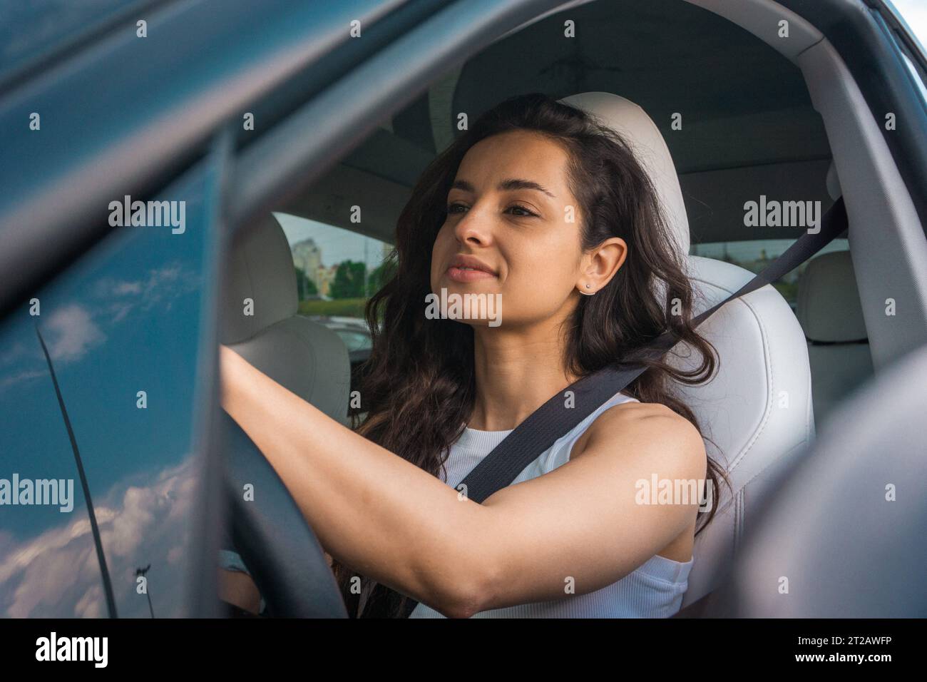 Woman wearing seat belt hi-res stock photography and images - Alamy