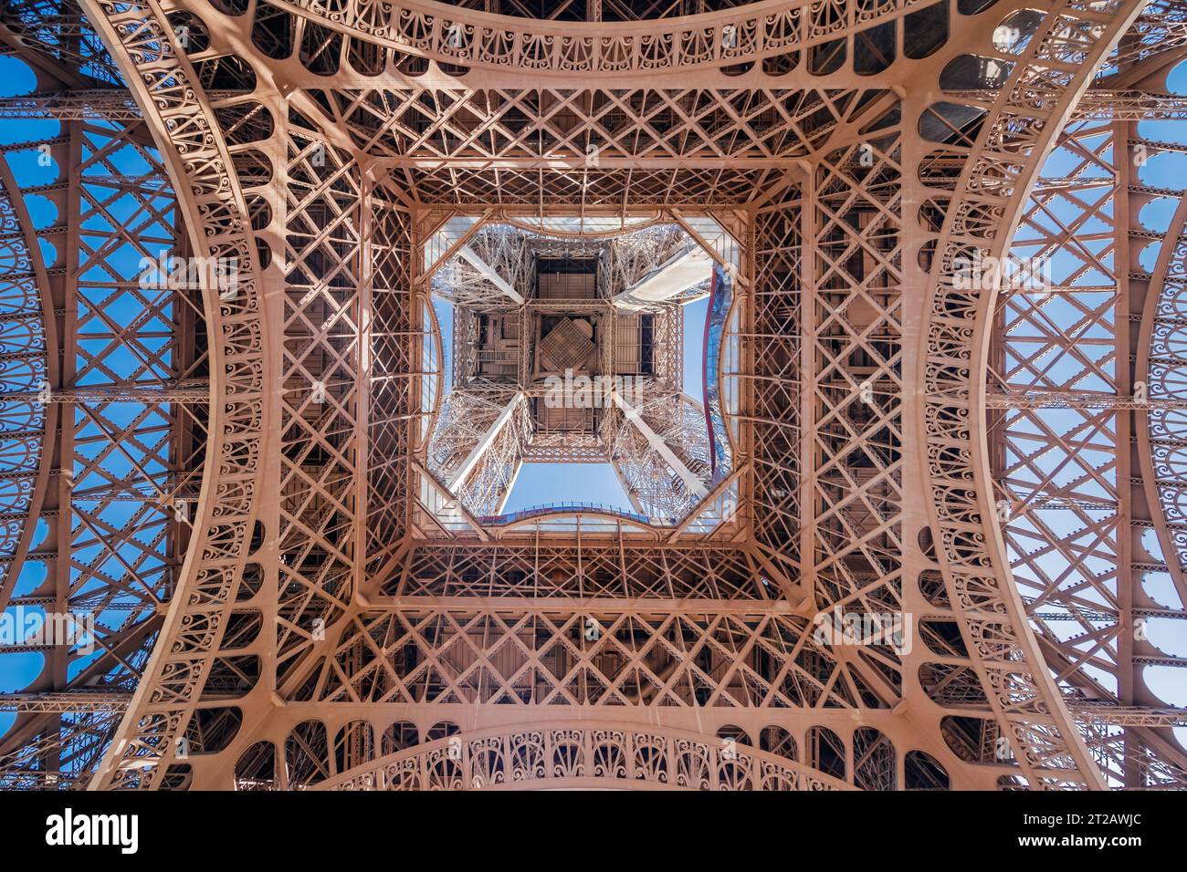 Under the Eiffel Tower, Paris, France, Europe, wide and low angle symmetrical view Stock Photo