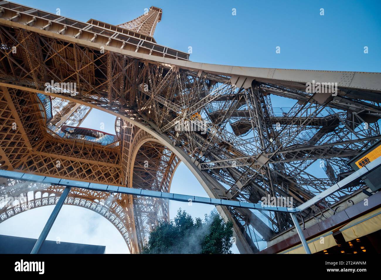 Under the Eiffel Tower, Paris, France, Europe, wide and low angle symmetrical view Stock Photo