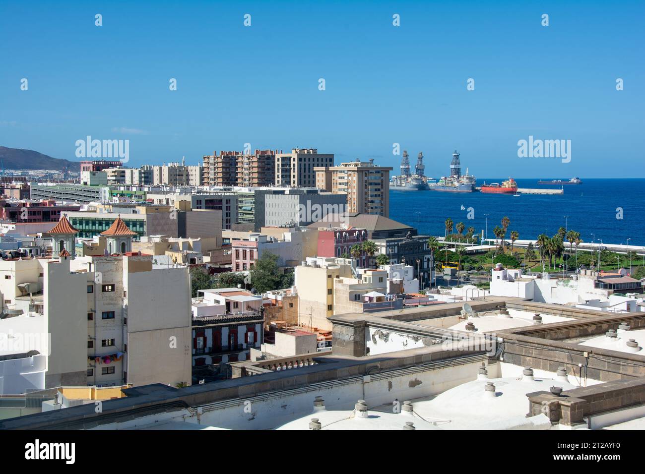 Panoramic view from above of the capital and part of the harbor in Las Palmas Gran Canaria in Spain with blue sky Stock Photo