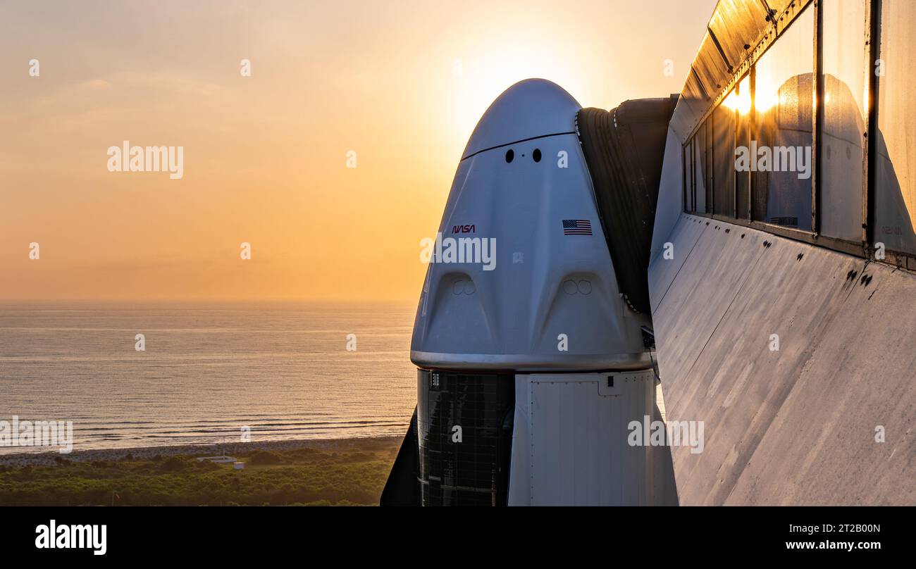 NASA's SpaceX Crew-7 at LC 39A - Sunrise. SpaceX’s Dragon spacecraft, atop the company’s Falcon 9 rocket, stands tall at the pad at Launch Complex 39A as the sun rises at NASA’s Kennedy Space Center in Florida on Wednesday, Aug. 23, 2023. NASA astronaut Jasmin Moghbeli, ESA (European Space Agency) astronaut Andreas Mogensen, JAXA (Japan Aerospace Exploration Agency) astronaut Satoshi Furukawa, and Roscosmos cosmonaut Konstantin Borisov, who arrived at Kennedy on Sunday, Aug. 20, 2023, will fly to the International Space Station on NASA’s SpaceX Crew-7 mission. Liftoff is targeted for 3:50 a.m. Stock Photo