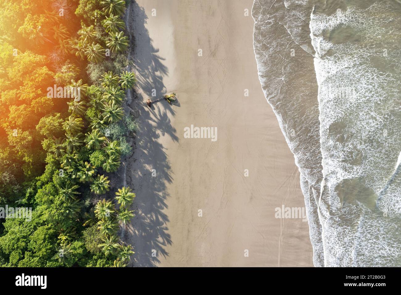 Beautiful tropical beach aerial above top drone view on sunny day Stock Photo