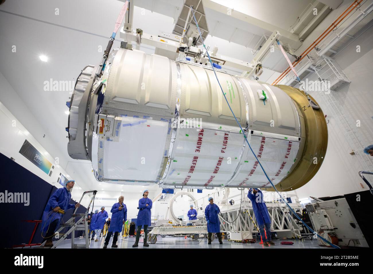Cygnus Module NASA and Northrop Grumman technicians lift the NG-20 Cygnus pressurized ...