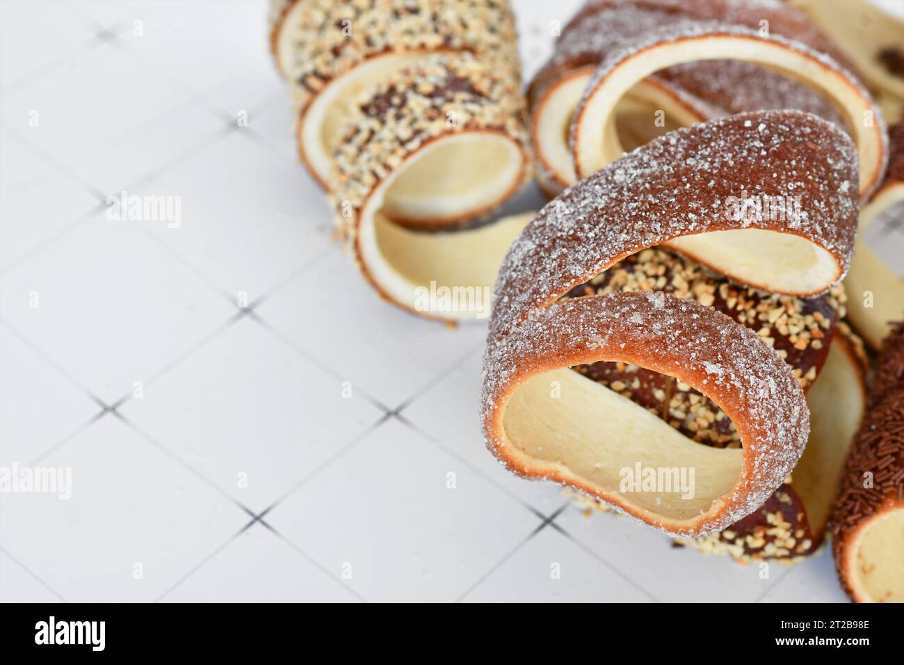 'Kurtoskalacs', with sugar, a spit cake with sugar from Hungary and Romania made from sweet yeast dough strips Stock Photo