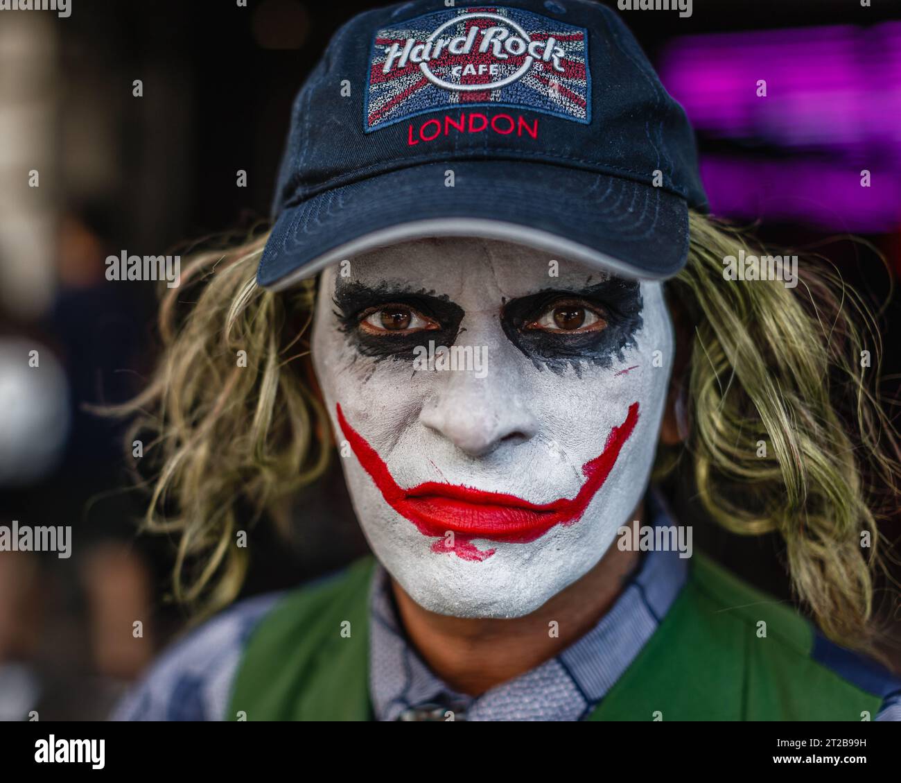The Joker almost smiles for a photograph in London. Stock Photo