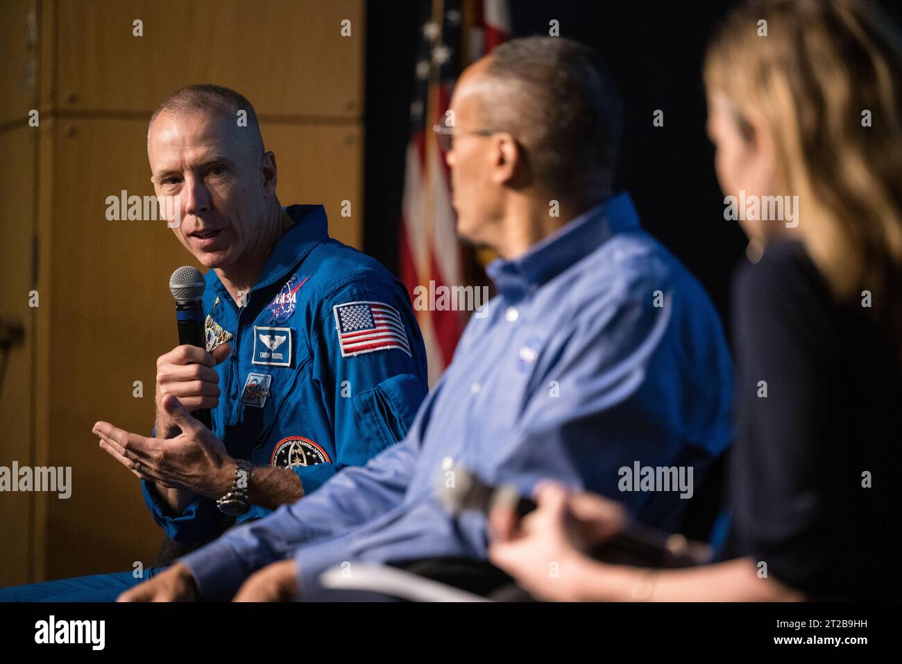 Earth Information Center Student Engagement Event. Former astronaut Drew Feustel answers a question from Earth Information Center Lead for NASA, Eleanor Stokes who moderated a question and answer session with him and former astronaut Alvin Drew during the Earth Information Center Student Engagement event at the Mary W. Jackson NASA Headquarters building, Friday, Sept. 29, 2023, in Washington. Stock Photo