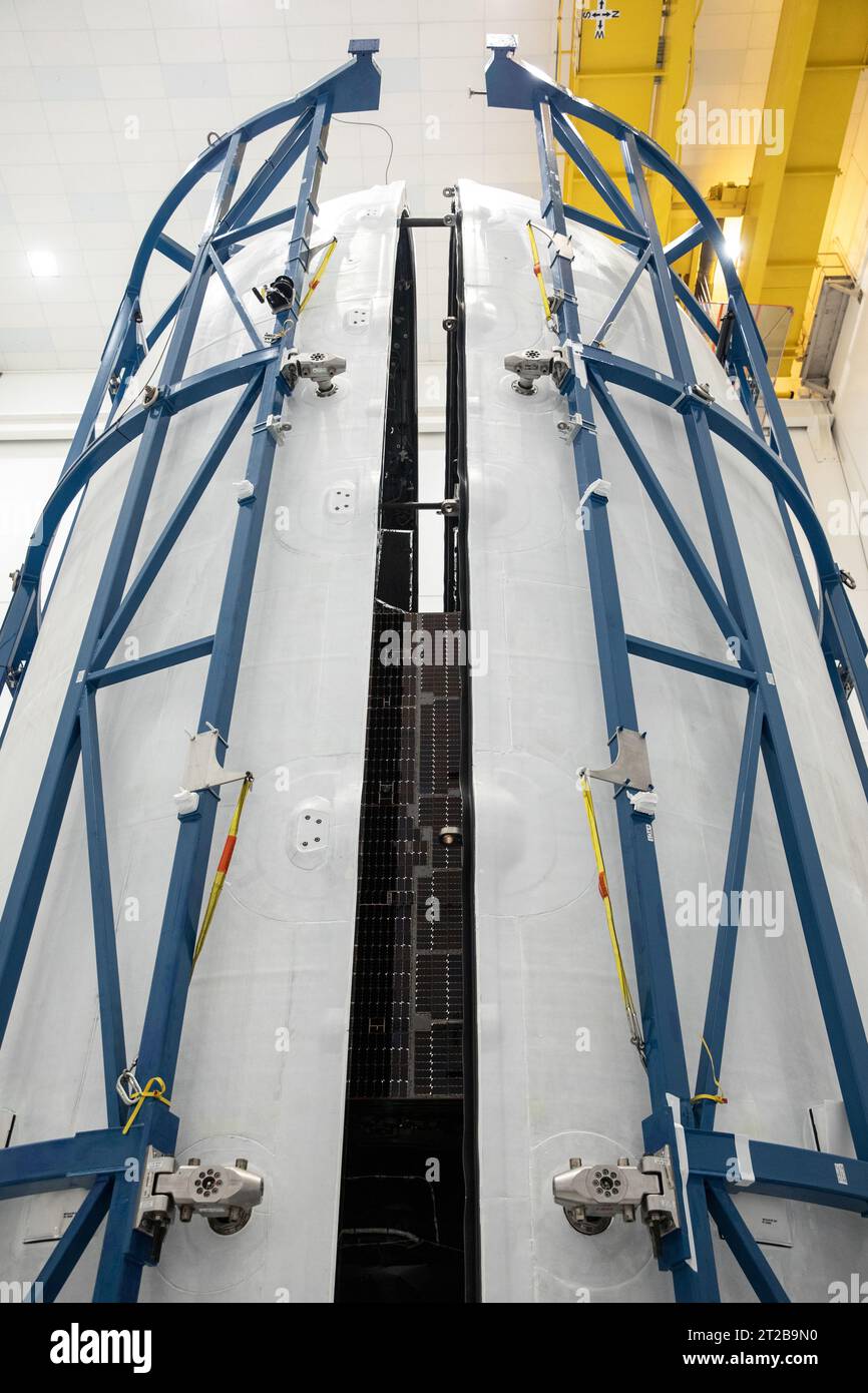 Psyche Encapsulation. Technicians encapsulate NASA’s Psyche spacecraft in its payload fairings – the cone at the top of the rocket – at the Astrotech Space Operations facility in Titusville, Florida, on Tuesday, Oct. 3, 2023. Next, the spacecraft will move to SpaceX facilities at NASA’s Kennedy Space Center. Bound for a metal-rich asteroid of the same name, the Psyche mission is targeting Thursday, Oct. 12, to launch from Kennedy. Liftoff, atop a SpaceX Falcon Heavy rocket, is targeted for 10:16 a.m. EDT from Launch Complex 39A. Stock Photo