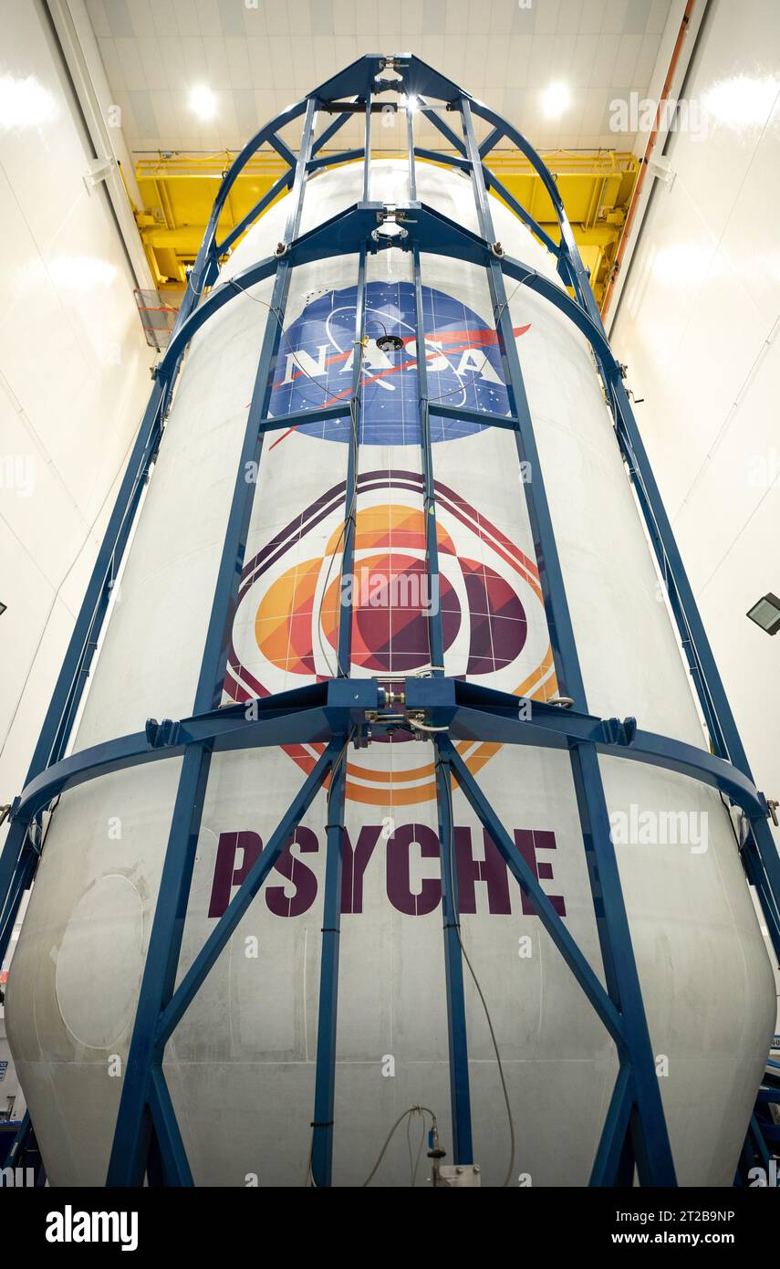 Psyche Encapsulation. Technicians encapsulate NASA’s Psyche spacecraft in its payload fairings – the cone at the top of the rocket – at the Astrotech Space Operations facility in Titusville, Florida, on Tuesday, Oct. 3, 2023. Next, the spacecraft will move to SpaceX facilities at NASA’s Kennedy Space Center. Bound for a metal-rich asteroid of the same name, the Psyche mission is targeting Thursday, Oct. 12, to launch from Kennedy. Liftoff, atop a SpaceX Falcon Heavy rocket, is targeted for 10:16 a.m. EDT from Launch Complex 39A. Stock Photo