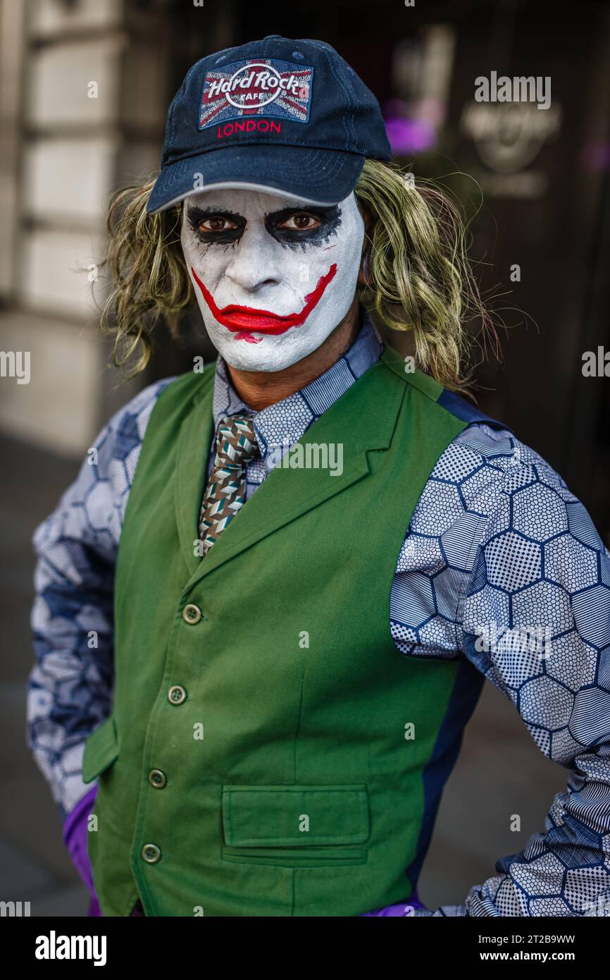 The 'psychopathic, mass-murdering, schizophrenic clown with zero empathy' Joker poses for a photograph in London. Stock Photo