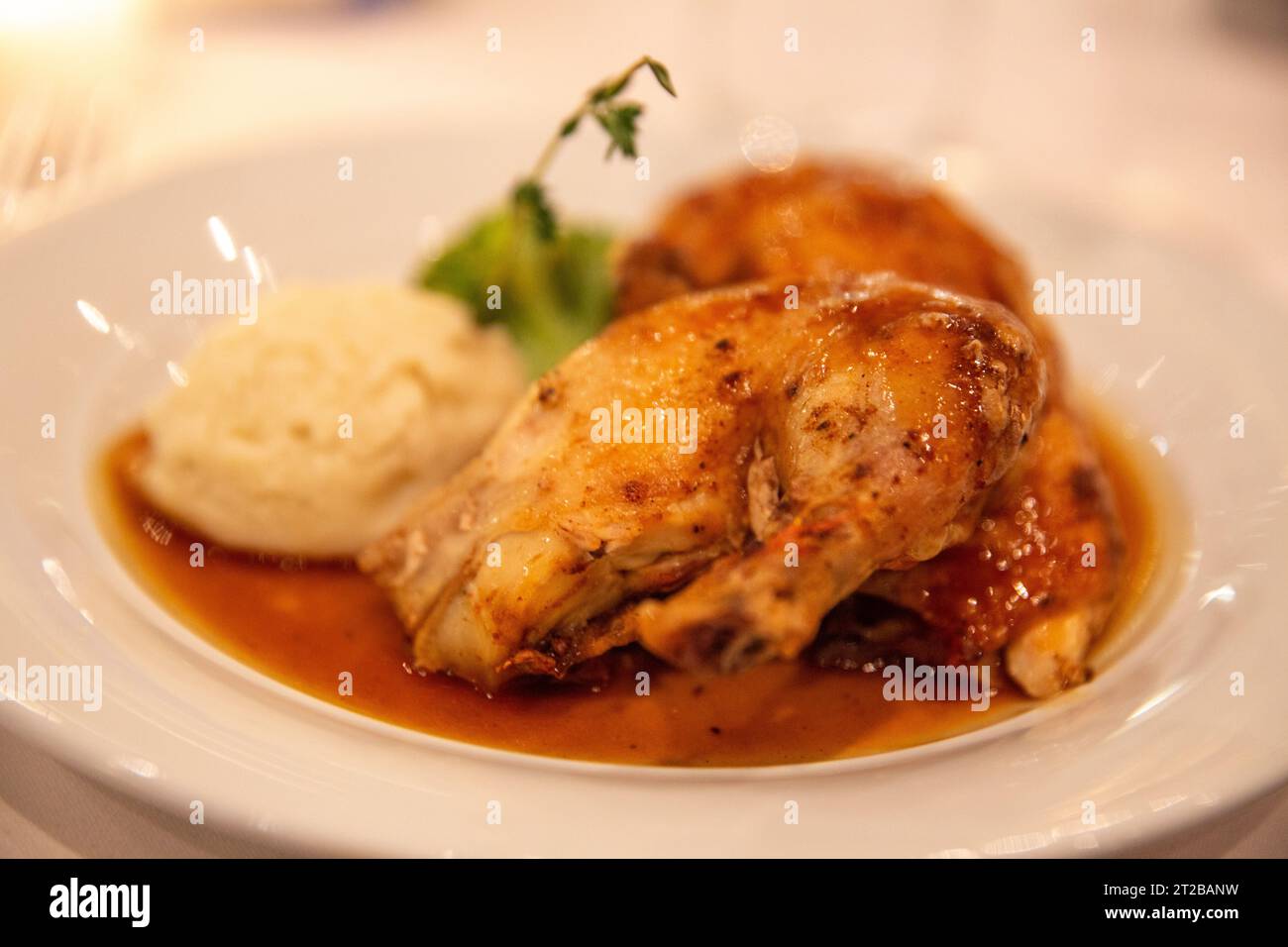 Cornish Game Hen with Thyme and Potatoes Stock Photo