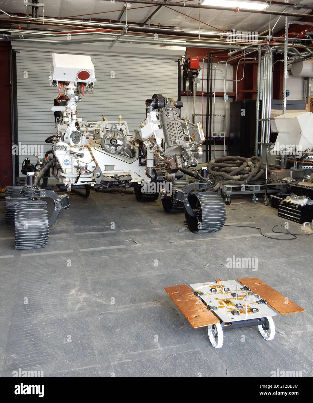 Perserverance Underneath Rover NASA's full-scale Perseverance engineering model OPTIMISM observes a ...
