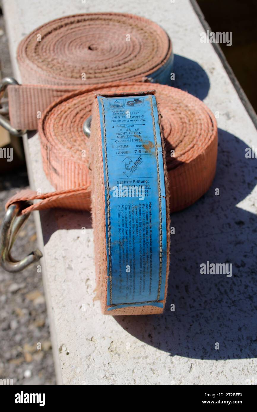 Nameplate of a tension strap for securing loads Stock Photo