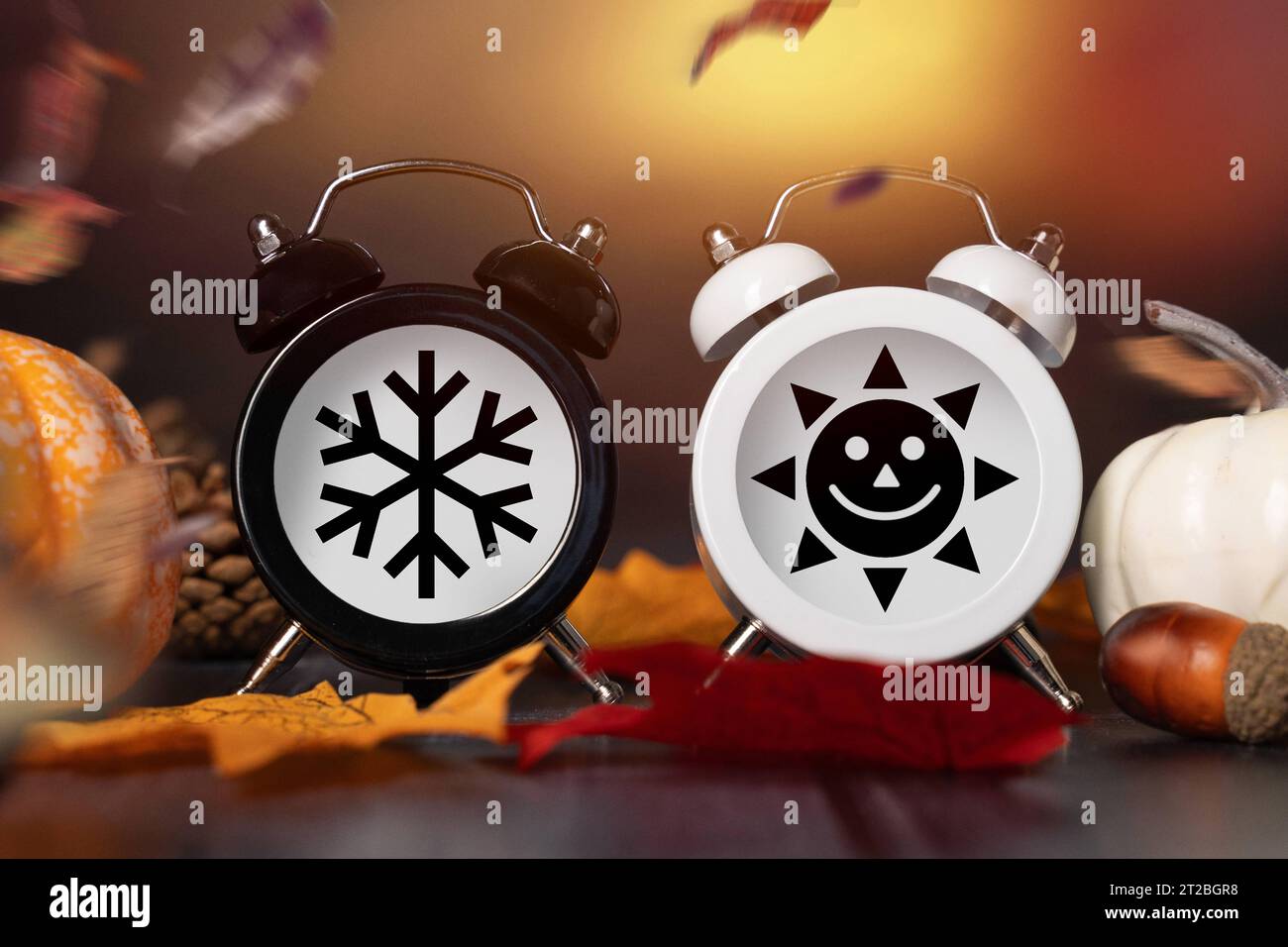 18 October 2023 Time change symbol image, two alarm clocks with sun