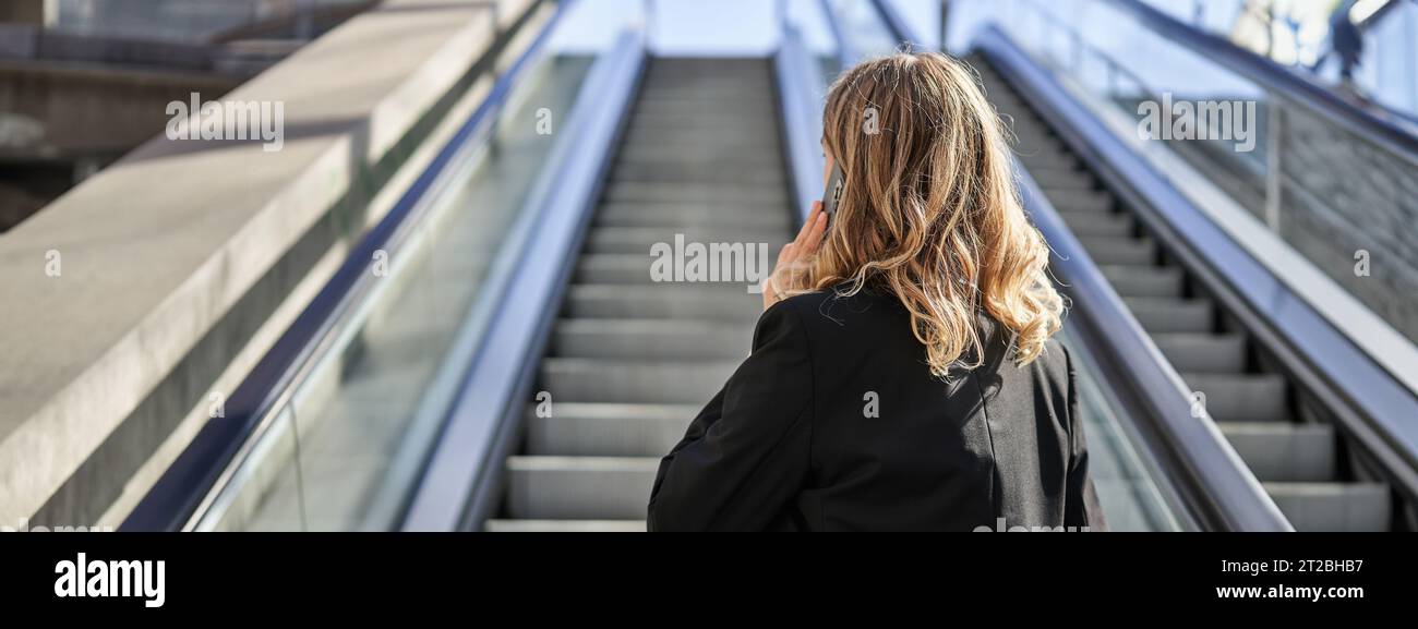 Female rear view mobile texting hi-res stock photography and images - Alamy