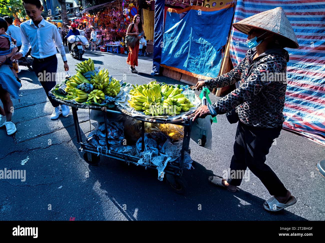 Vendor selling Buddha’s Hand fruit (fingered citron) Hanoi, Vietnam Stock Photo