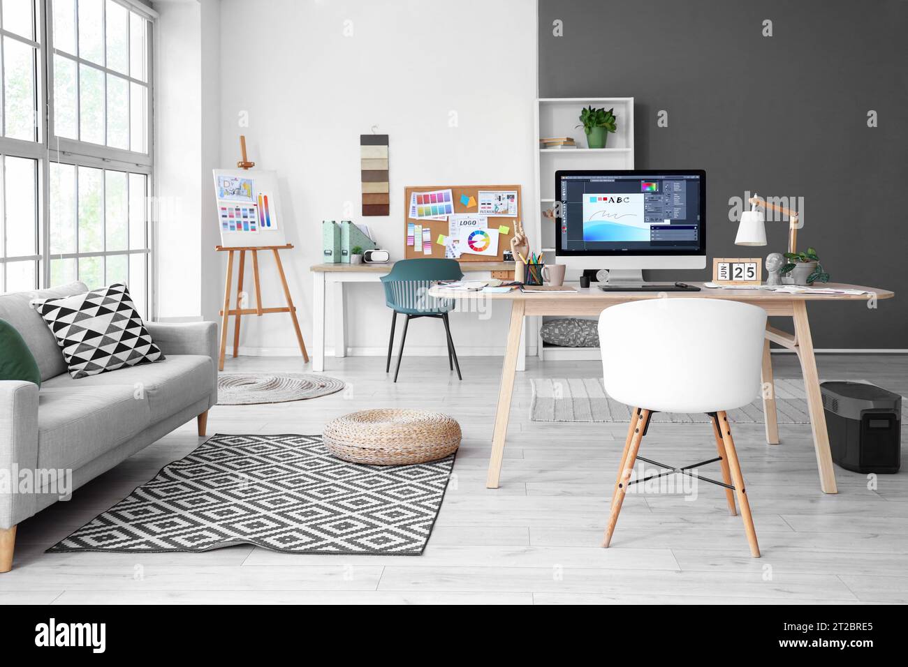 Interior designer's workplace with computer in office Stock Photo - Alamy