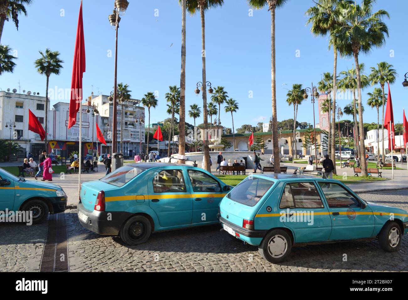 TANGIER, MOROCCO - NOVEMBER 9, 2015: Petits Taxis (Eng. small taxis) at Grand Socco (officially known as Place du Grand 9 Avril 1947), a large square. Stock Photo