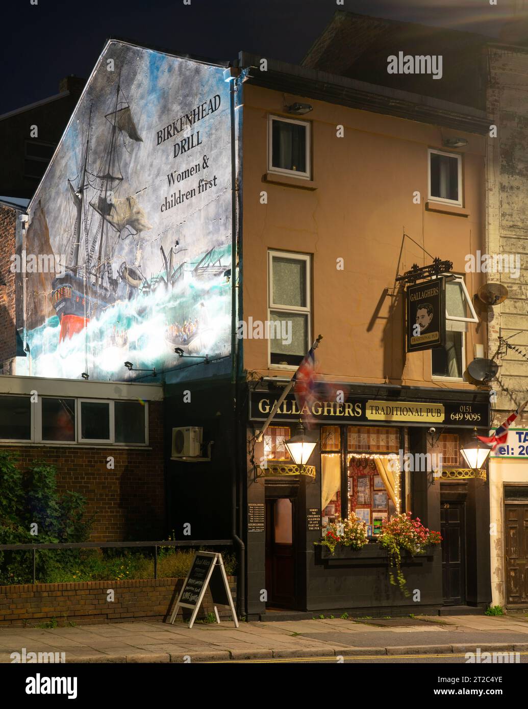 Gallagher's Traditional Pub, Birkenhead in October 2023. Note the Birkenhead Drill Mural on the gable. Stock Photo